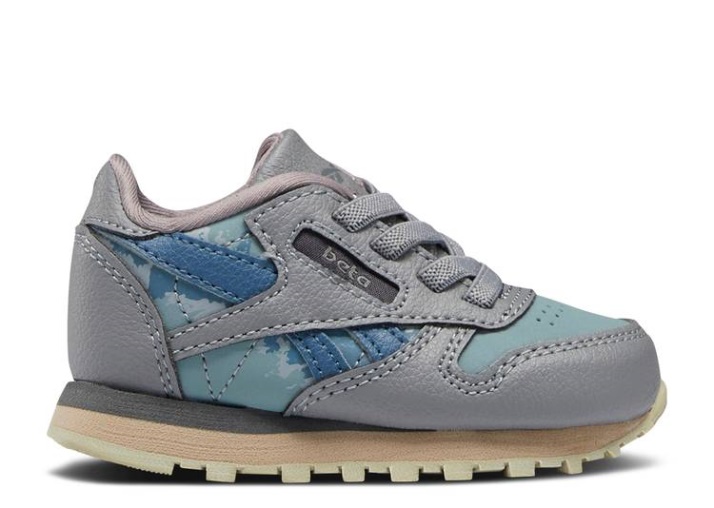 Reebok Jurassic World X Classic Cuero Niño - Azul Y Beta